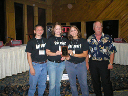 image of the team with their winning plaque